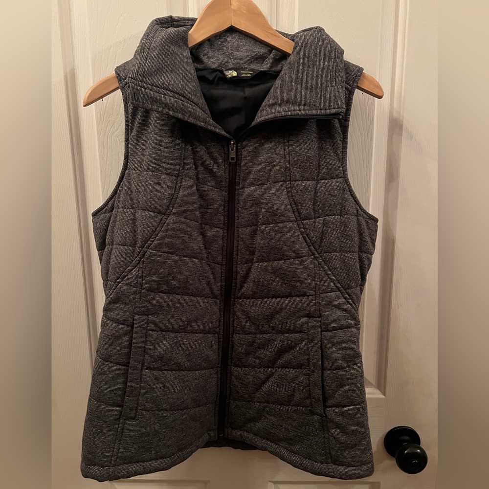The North Face grey Polyester puffer vest..